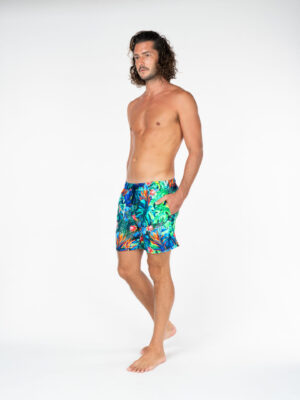 Men's premium beach shorts side on Botanic Paradise print from La Vida Loca